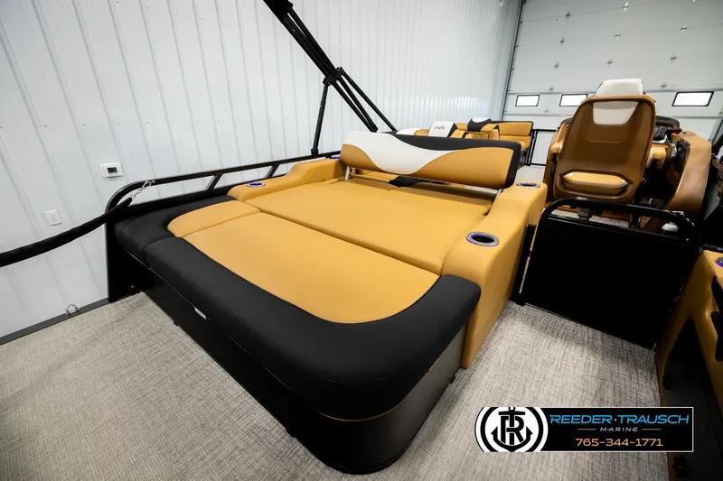 Slide: The Image of 2026 Avalon LSZ VRB boat interior with luxurious tan seating and modern design. - 26