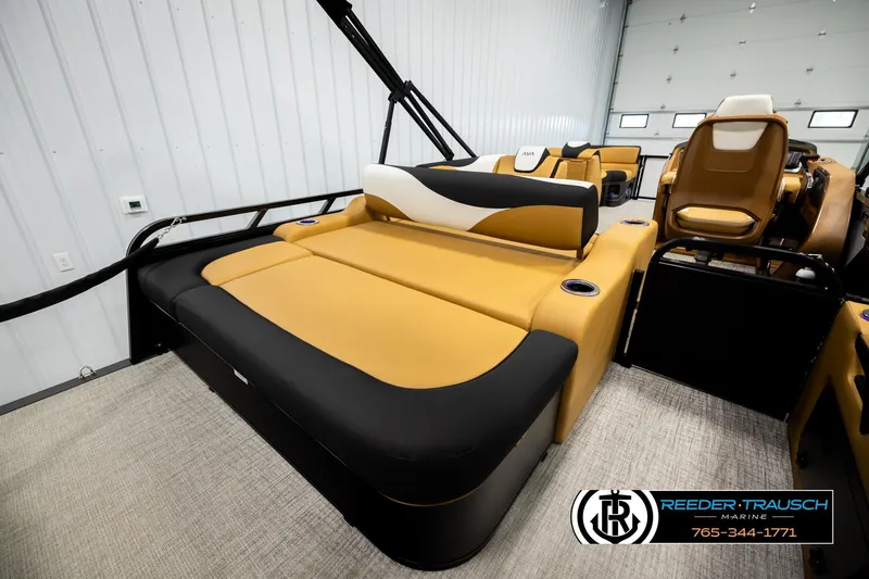 Slide: The Image of 2026 Avalon LSZ VRB boat interior with luxurious tan and black seating. - 27