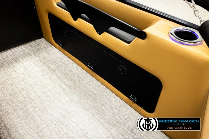 Slide: The Image of 2026 Avalon LSZ VRB interior with tan upholstery and cup holder detail. - 29