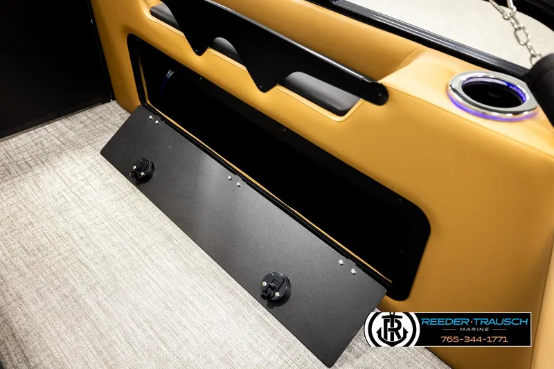 Slide: The Image of 2026 Avalon LSZ VRB interior detail with storage compartment and cup holder. - 30