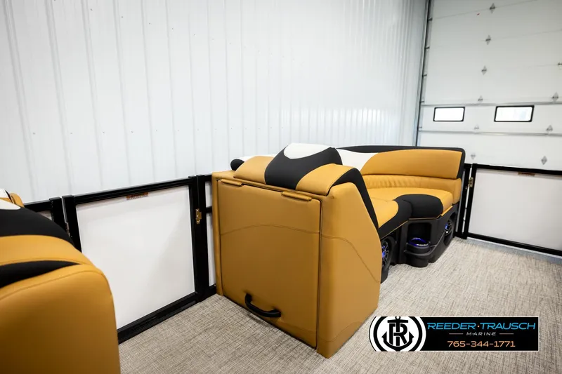 Slide: The Image of Luxurious 2026 Avalon LSZ VRB boat interior with stylish seating in a modern garage. - 31