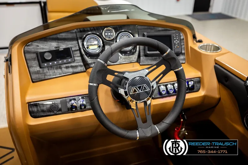 Slide: The Image of Steering wheel and dashboard of 2026 Avalon LSZ VRB boat, featuring modern controls. - 34
