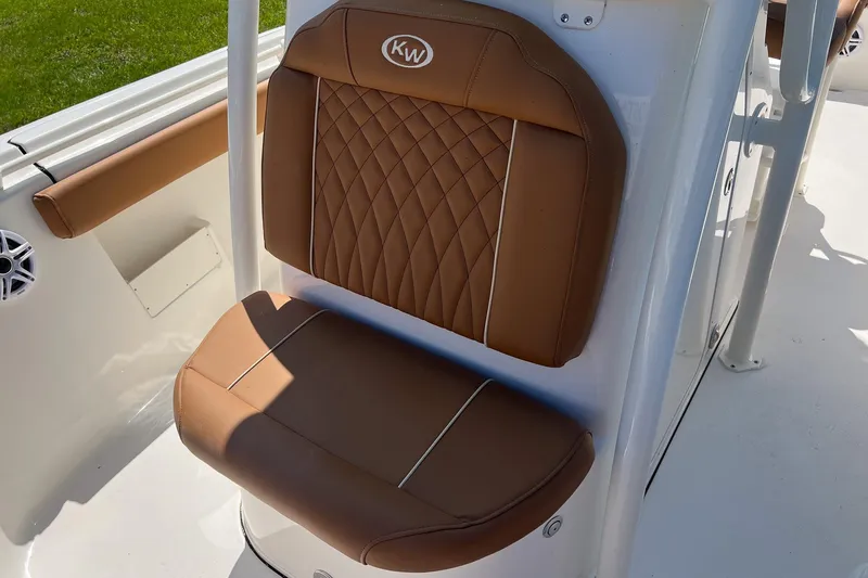 Slide: The Image of 2026 Key West 239 FS boat seat with brown leather upholstery and diamond stitching. - 22