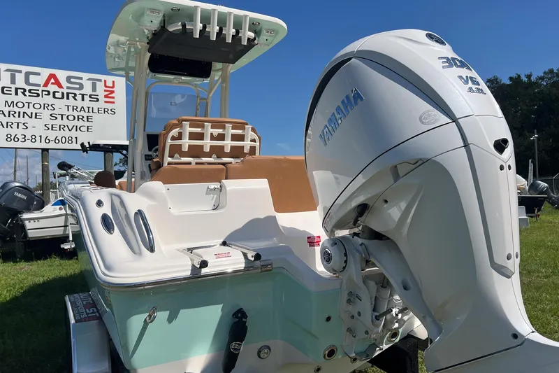 Slide: The Image of 2026 Key West 239 FS boat with Yamaha engine displayed outdoors. - 5
