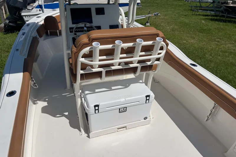 Slide: The Image of 2026 Key West 239 FS boat interior with seating and storage on display. - 7