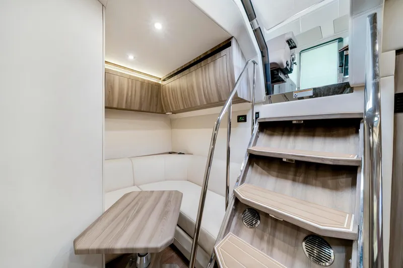 Slide: The Image of Luxurious interior of 2017 Regal 53 Sport Coupe with modern seating and wooden accents. - 25