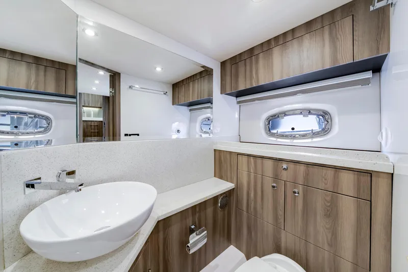Slide: The Image of Luxurious bathroom interior of 2017 Regal 53 Sport Coupe yacht with modern fixtures. - 33