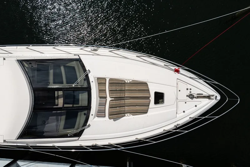 Slide: The Image of Overhead view of 2017 Regal 53 Sport Coupe yacht on water. - 8