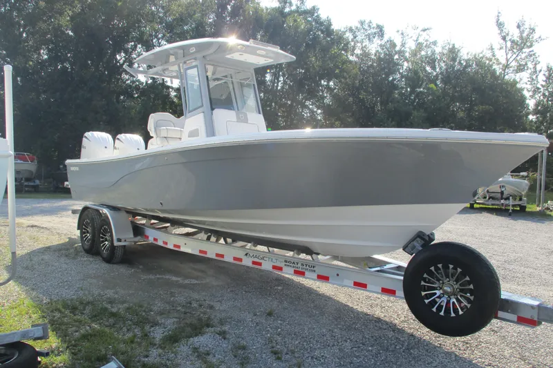 The Image of 2026 Sea Fox 282 Hybrid LT boat on trailer, parked outdoors. - 0