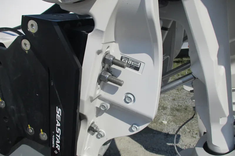 Slide: The Image of Close-up of Sea Fox 282 Hybrid LT 2026 boat engine mount with SeaStar hydraulic steering. - 21