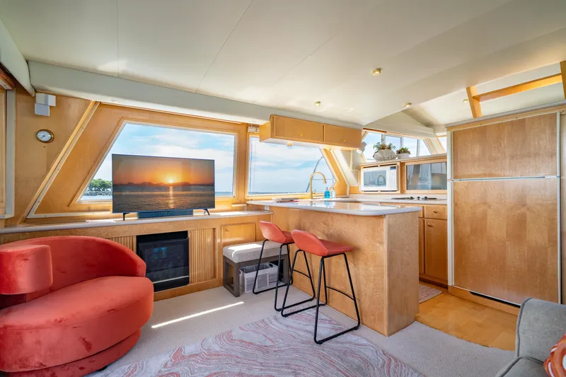 Slide: The Image of Luxurious interior of 2000 Navigator 5300 Classic yacht with modern kitchen and seating area. - 15