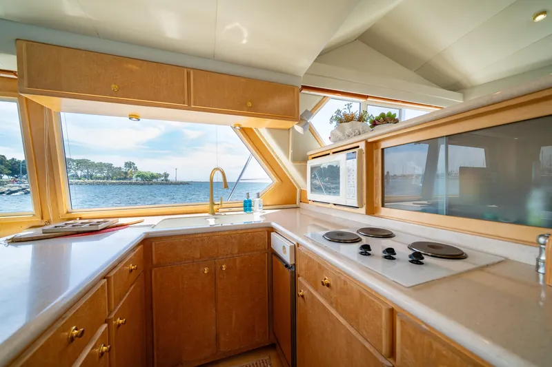Slide: The Image of Luxurious kitchen interior of 2000 Navigator 5300 Classic yacht with ocean view. - 17
