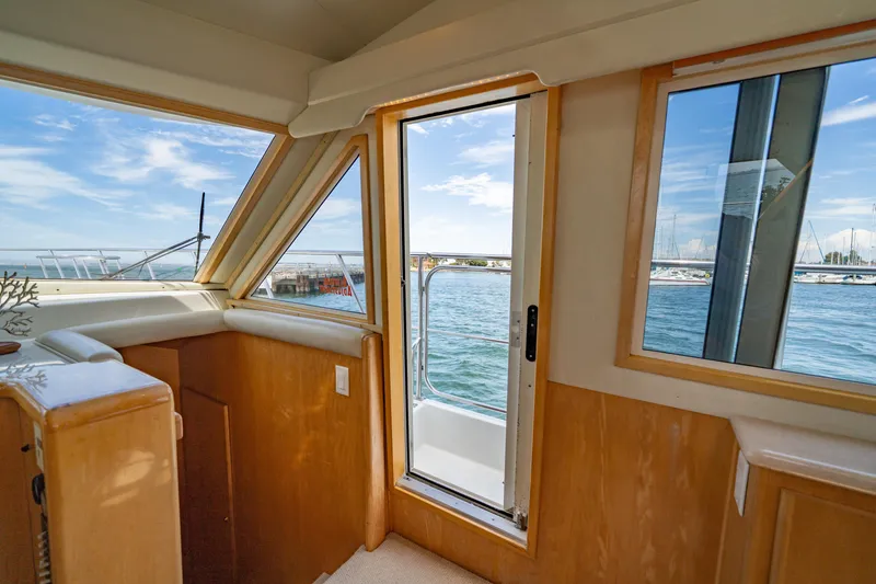 Slide: The Image of Interior view of 2000 Navigator 5300 Classic yacht with open door to ocean. - 25