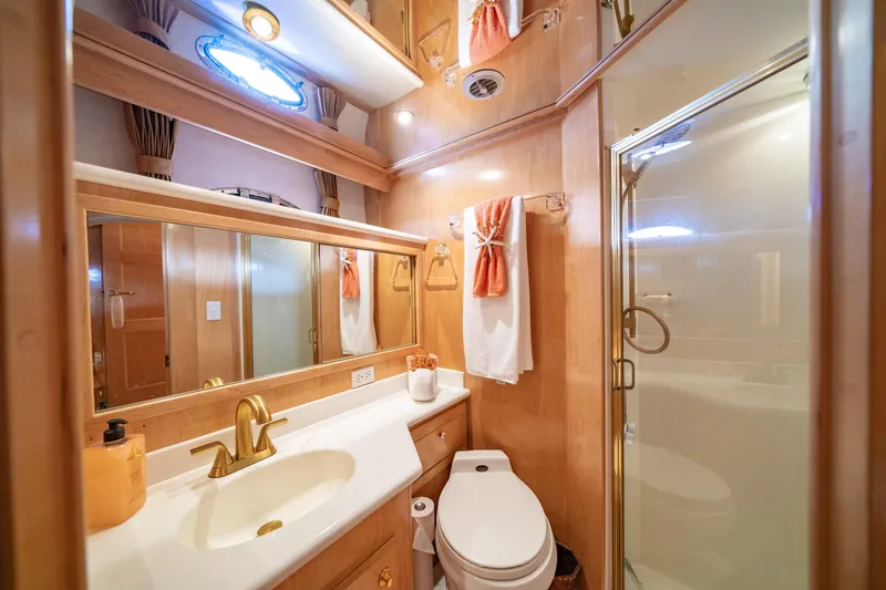 Slide: The Image of Luxurious bathroom in 2000 Navigator 5300 Classic yacht with elegant fixtures and shower. - 36
