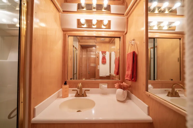 Slide: The Image of Luxurious bathroom in 2000 Navigator 5300 Classic yacht with elegant lighting and fixtures. - 42