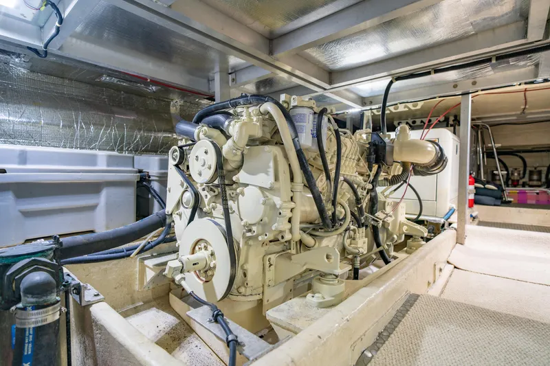 Slide: The Image of Engine room of 2000 Navigator 5300 Classic yacht, showcasing detailed machinery and components. - 45