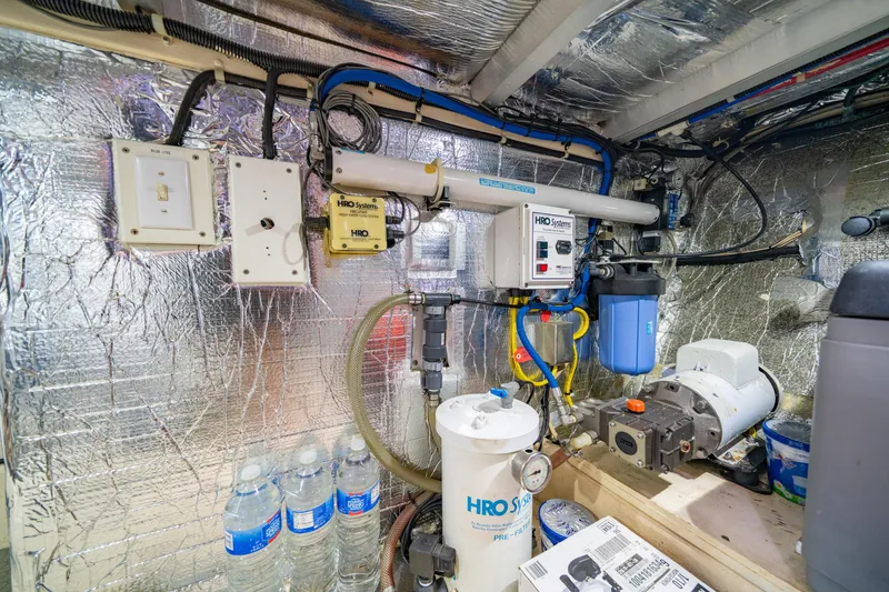 Slide: The Image of Engine room of 2000 Navigator 5300 Classic with HRO Systems water filtration equipment. - 48