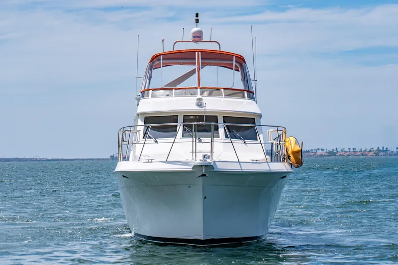 Slide: The Image of Front view of a 2000 Navigator 5300 Classic yacht on open water. - 6