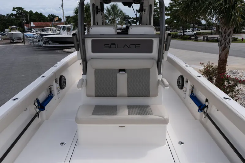 Slide: The Image of 2026 Solace 28 HCS boat interior with seating and modern design features. - 24