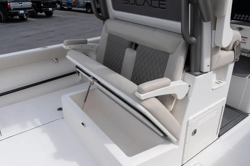 Slide: The Image of 2026 Solace 28 HCS boat seat with storage compartment, featuring modern design and functionality. - 26