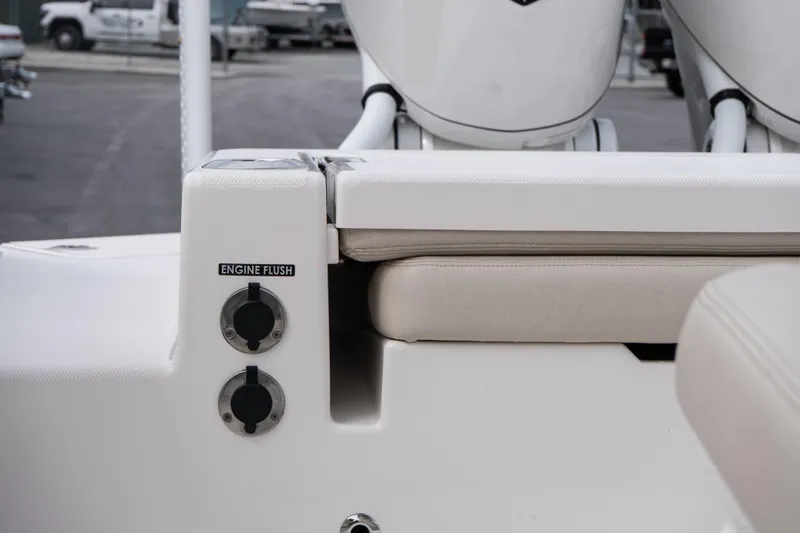 Slide: The Image of 2026 Solace 28 HCS boat engine flush system, white seating detail. - 35