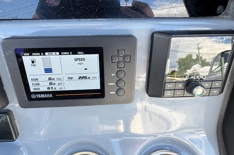 Slide: The Image of Dashboard of 2021 Tidewater 272 CC Adventure with Yamaha display and JL Audio system. - 13