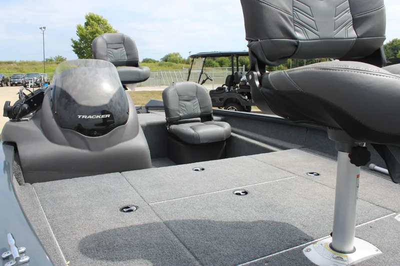 Slide: The Image of 2020 Tracker Pro Team 175 TF fishing boat interior with seating and console. - 11
