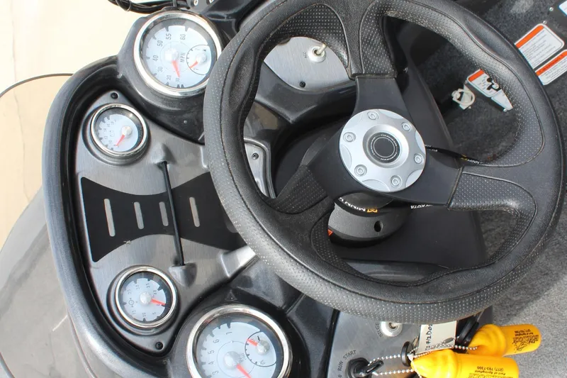 Slide: The Image of 2020 Tracker Pro Team 175 TF dashboard with steering wheel and gauges. - 17