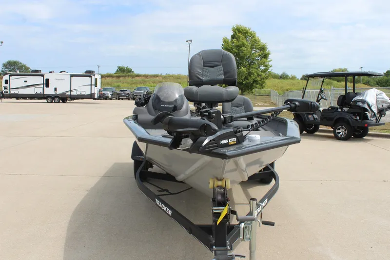 Slide: The Image of 2020 Tracker Pro Team 175 TF fishing boat on trailer in parking lot. - 2