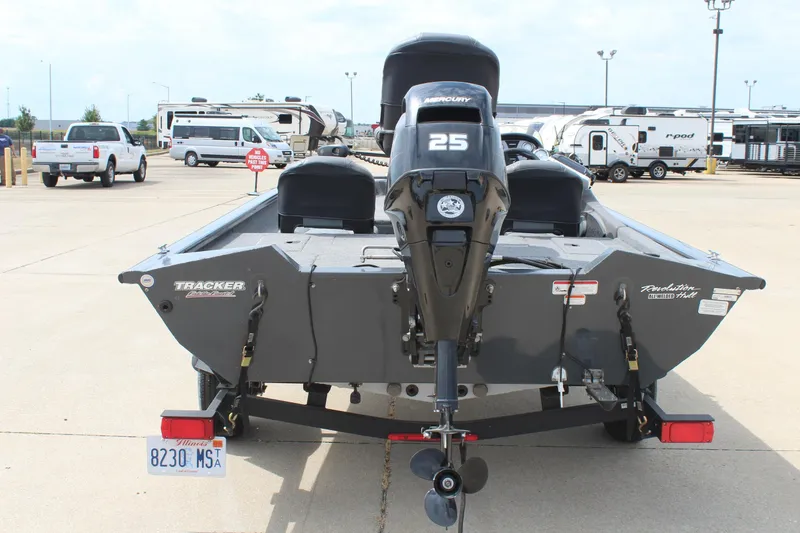 Slide: The Image of 2020 Tracker Pro Team 175 TF boat with Mercury 25 engine in parking lot. - 6