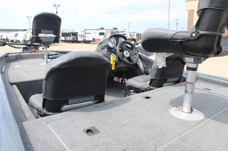 Slide: The Image of 2020 Tracker Pro Team 175 TF boat interior with seating and steering wheel. - 8