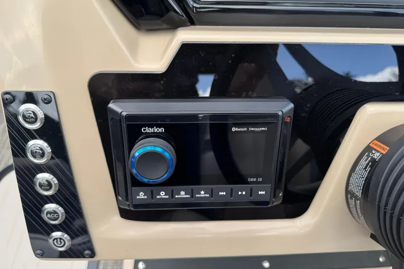 Slide: The Image of Control panel of 2026 Viaggio Lago X22D Tritoon with Clarion audio system. - 11