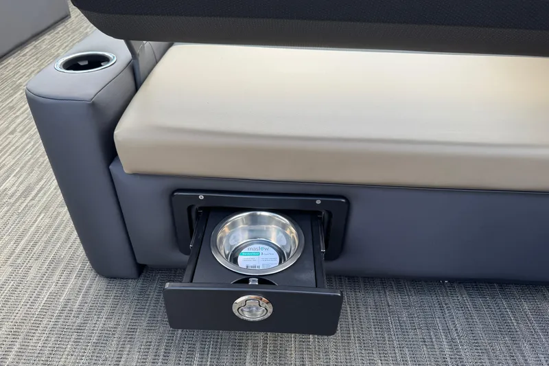 Slide: The Image of Viaggio Lago X22D Tritoon 2026 with built-in pet bowl drawer under seat. - 20