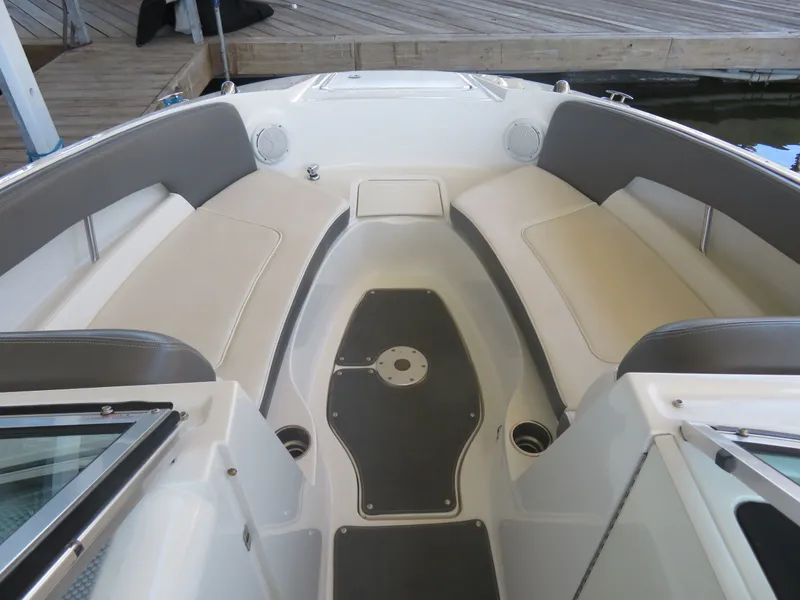Slide: The Image of Interior of 2011 Sea Ray 240 Sundeck with seating area. - 2