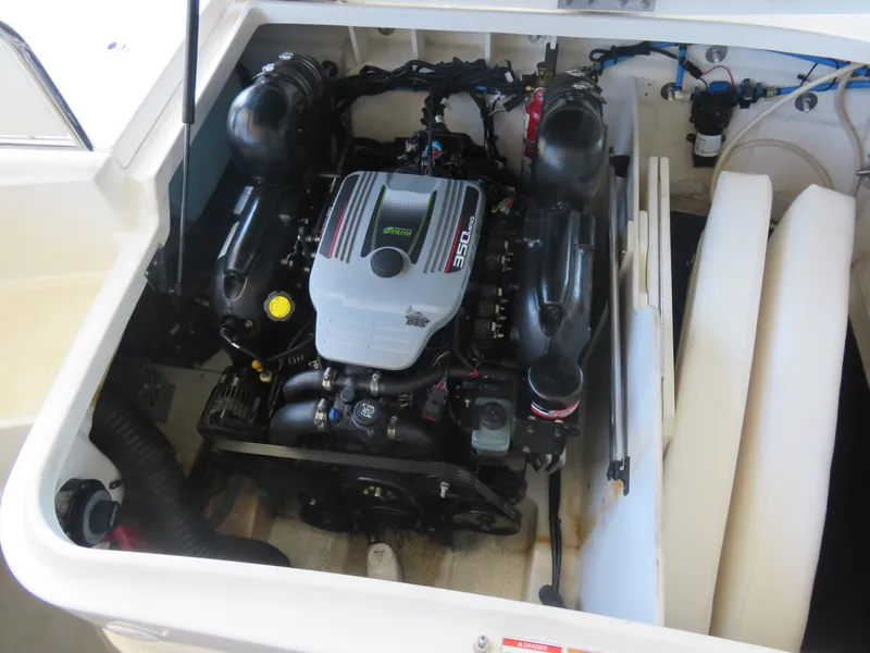 Slide: The Image of Engine compartment of a 2011 Sea Ray 240 Sundeck boat. - 7