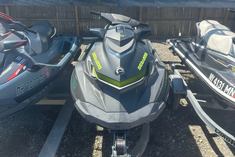 Slide: The Image of 2015 Sea-Doo GTI Limited 155 jet ski parked on a trailer. - 2