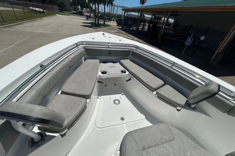 Slide: The Image of 2021 Sea Pro 239 Center Console boat with spacious seating and modern design. - 16