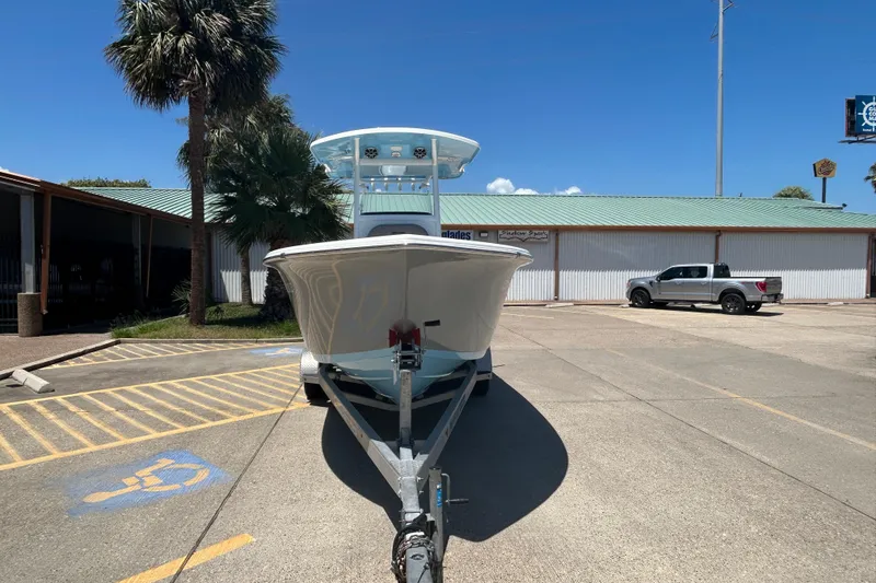 Slide: The Image of 2021 Sea Pro 239 Center Console boat on trailer in parking lot. - 3