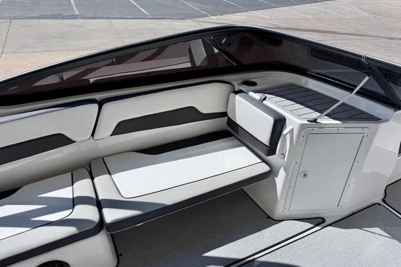 Slide: The Image of 2025 Yamaha Boats AR195 interior with sleek seating and modern design. - 13