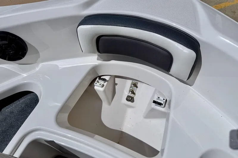 Slide: The Image of 2025 Yamaha Boats AR195 interior seating and storage compartment. - 17