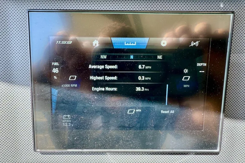 Slide: The Image of Yamaha AR195 2025 dashboard display showing speed, fuel, and engine hours. - 26