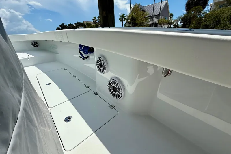 Slide: The Image of 2023 Freeman 34VH boat interior with speakers and storage compartments. - 15
