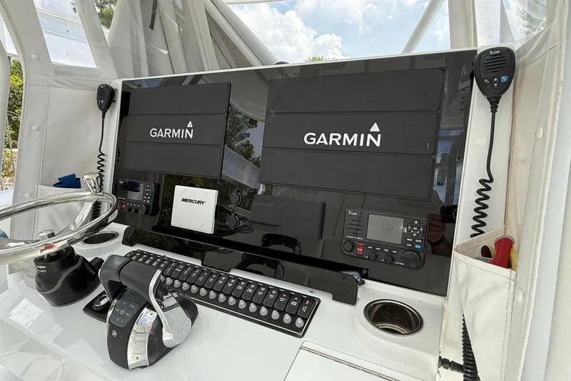 Slide: The Image of Control panel of 2023 Freeman 34VH boat with Garmin navigation system. - 22