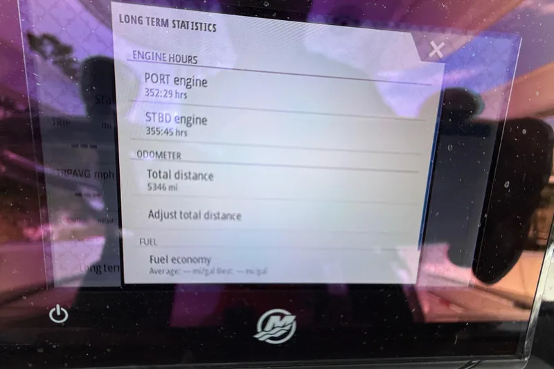 Slide: The Image of Display showing engine hours and odometer statistics on a 2023 Freeman 34VH. - 23