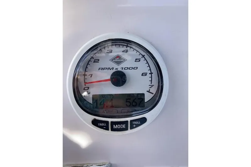 Slide: The Image of Tachometer of 2005 Donzi 35 ZF Daytona boat displaying RPM and voltage. - 50