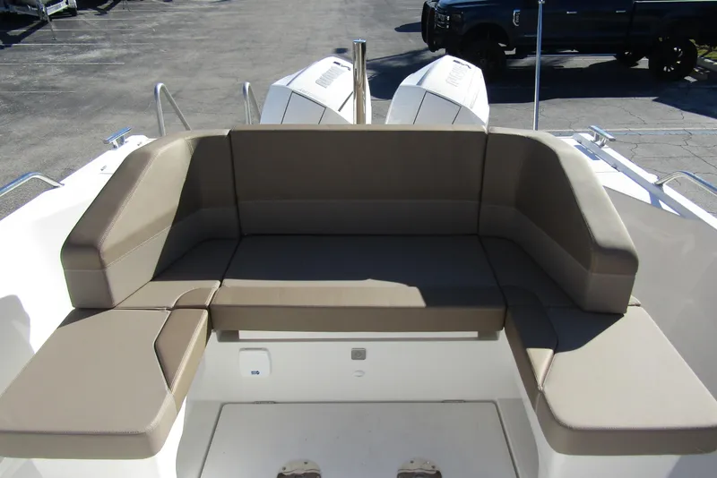 Slide: The Image of Luxurious seating on 2025 Nimbus Tender 9 boat, featuring comfortable cushions. - 34