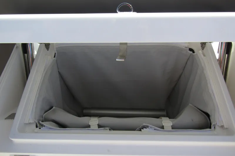 Slide: The Image of Open storage compartment in 2025 Nimbus Tender 9 boat. - 38