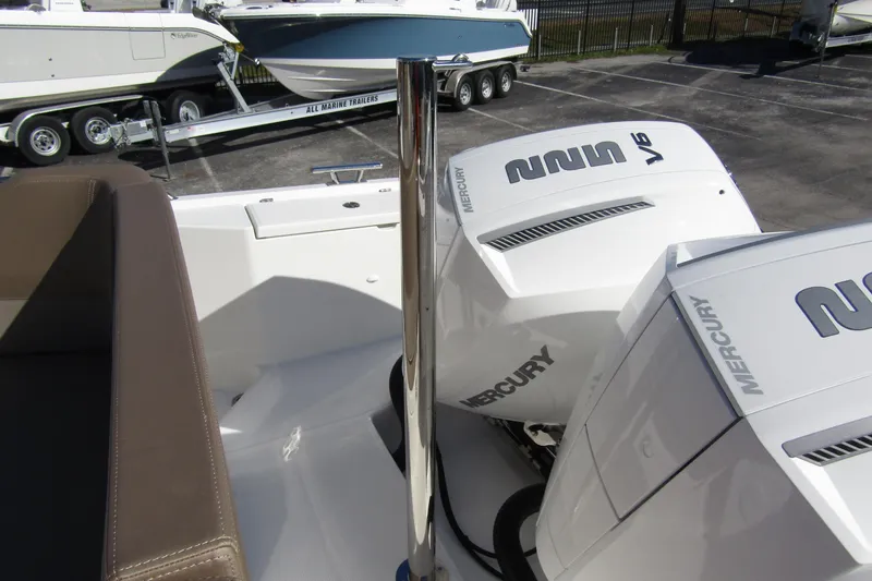 Slide: The Image of 2025 Nimbus Tender 9 with Mercury V6 engines, parked on a trailer. - 43