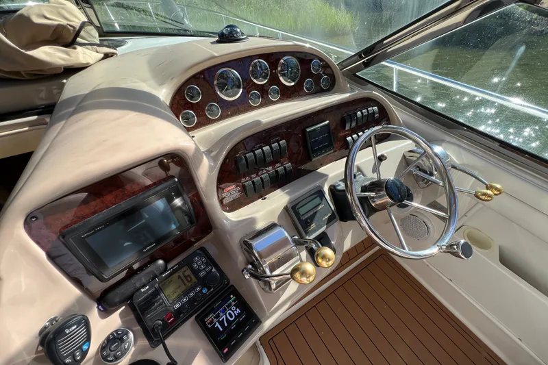 Slide: The Image of 2002 Sea Ray 360 Sundancer with Electronics Covers off and Electronics On - 14