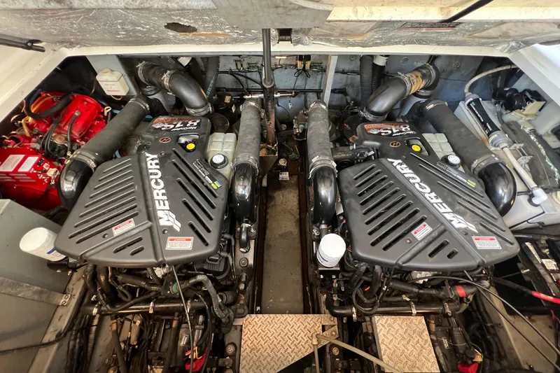 Slide: The Image of 2002 Sea Ray 360 Sundancer Engine Compartment featuring Twin MerCruiser 8.1S Horizon Inboard Engines - 15